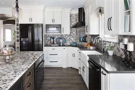 beige kitchen cabinet with black stainless steel appliances|black stainless steel cabinet color schemes.